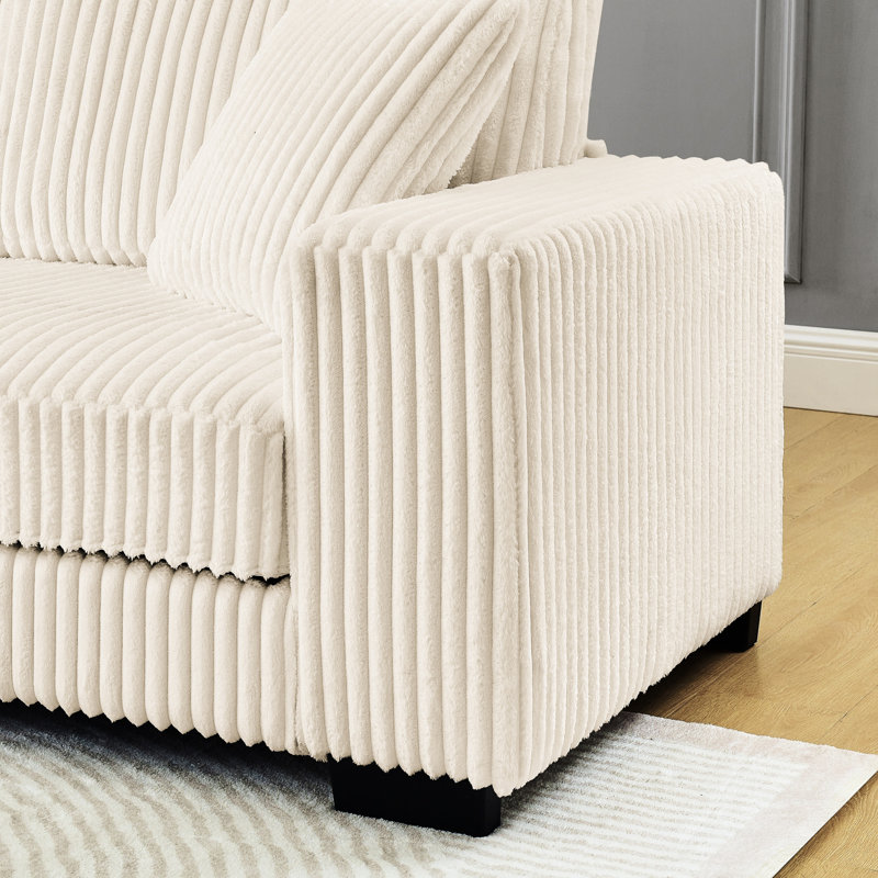Beige en velours côtelé modulaire convertible en forme de L, revêtement doux au toucher et repose-pieds en arc beige