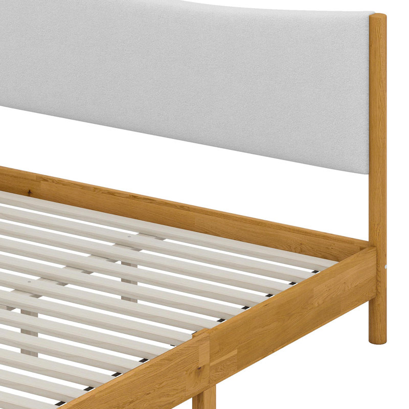 Cadre de lit minimaliste avec tête de lit moelleuse et pieds de soutien intégrés