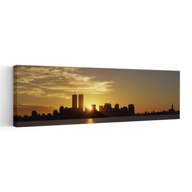 Manhattan Skyline And A Statue At Sunrise Statue Of Liberty New York City New York State USA by Richard Sisk - Wrapped Canvas Panoramic Print