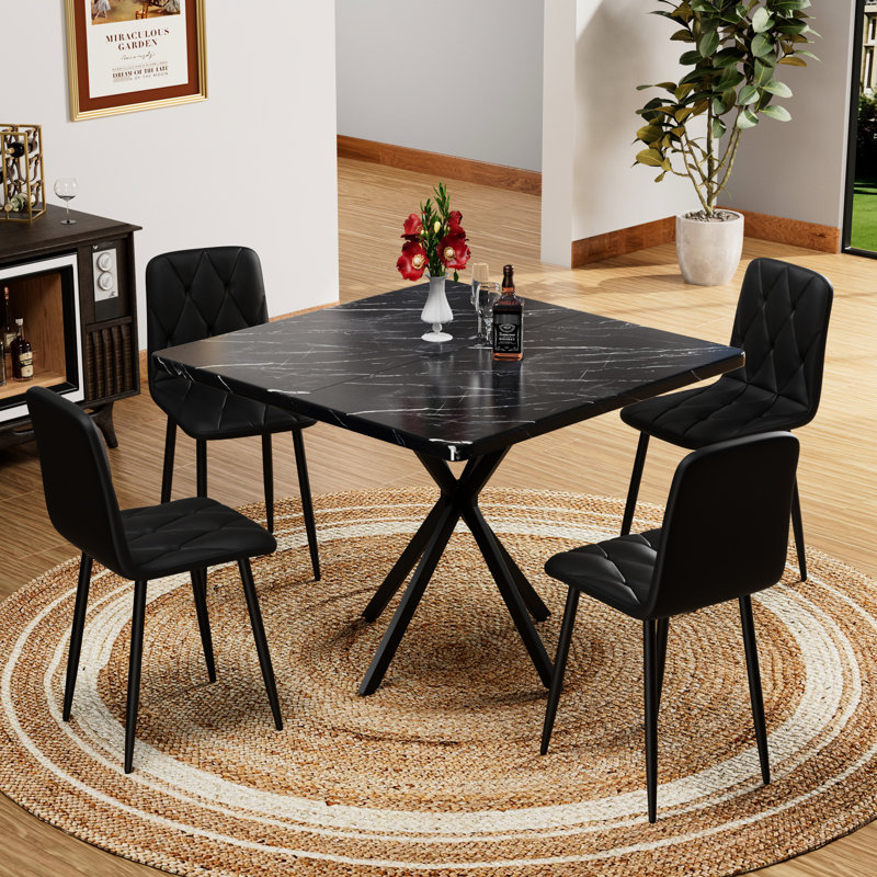 Chaises de salle à manger modernes de 4 personnes, siège recouvert de cuir d'unité centrale, pieds robustes en métal, 4 chaises noires pour la chambre, expérience confortable, facile à assembler