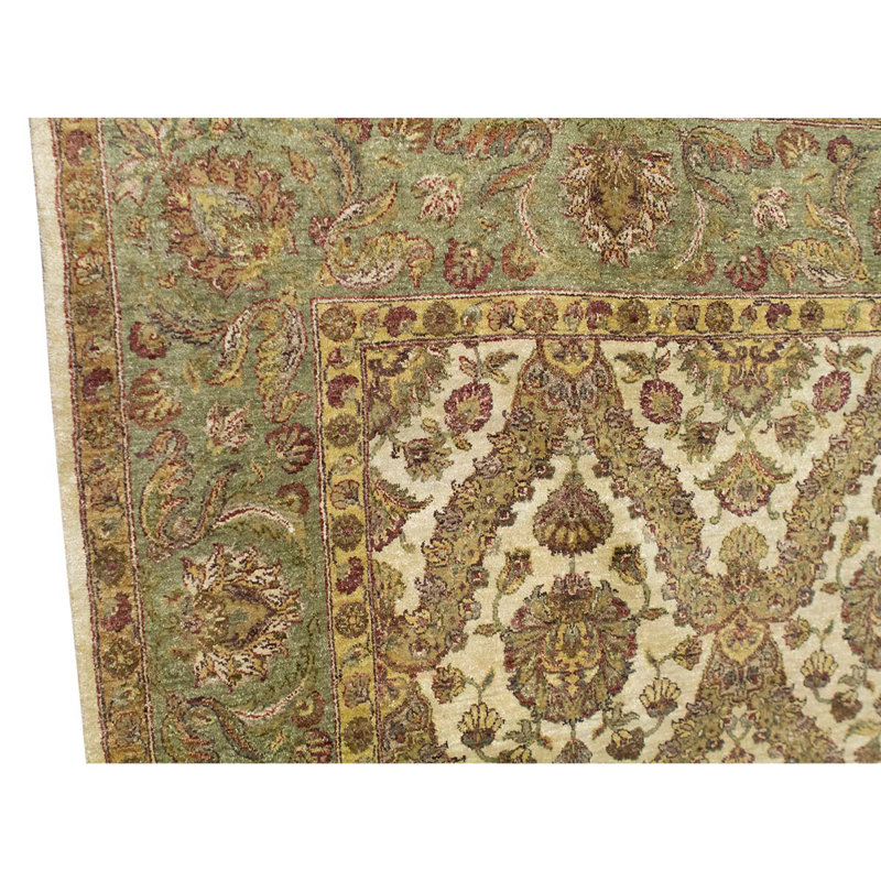 Tapis beige / ivoire noué à la main