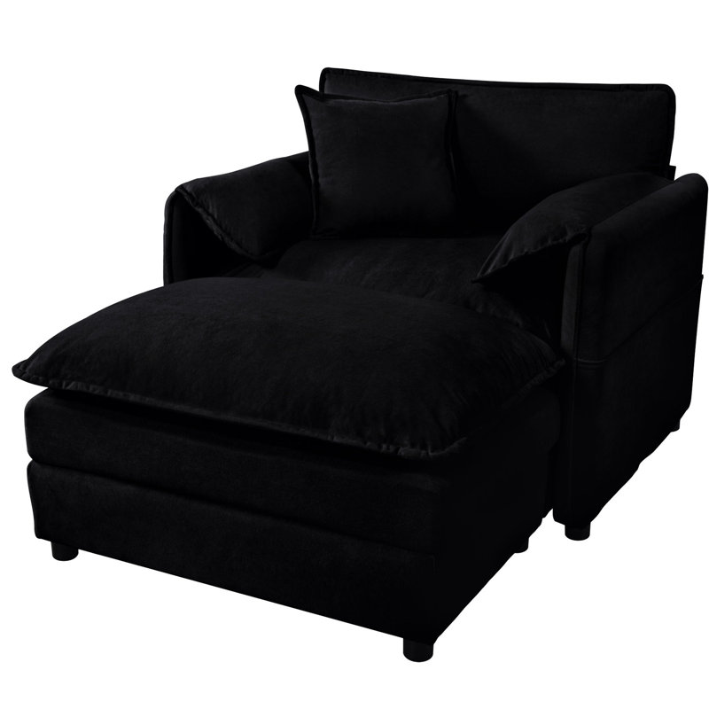 Fauteuil inclinable noir avec revêtement en chenille pour le salon. Siège profond, coussins à double couche, fauteuil surdimensionné, pièce ou chambre à coucher. Combinaison de bricolage, noir. Spacieux et confortable
