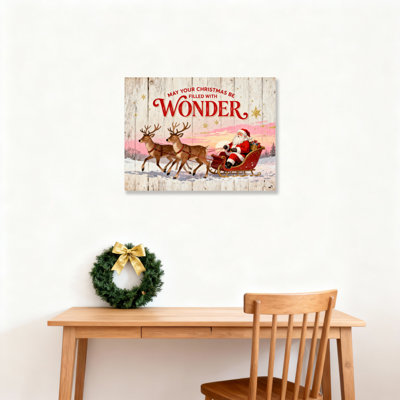 Art mural en toile Père Noël renne