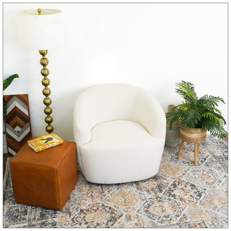 Luxueuse chaise pivotante avec tissu bouclé pour un confort ultime