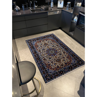 Tapis décoratif multicolore à motifs bleus et beige