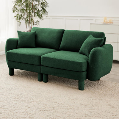Sofa with unique shell-shaped armrests