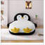 Fauteuil-lit pingouin en fausse fourrure moelleuse, garni de mousse à 100 %, pour le confort de la chambre et de la salle de jeux des enfants.