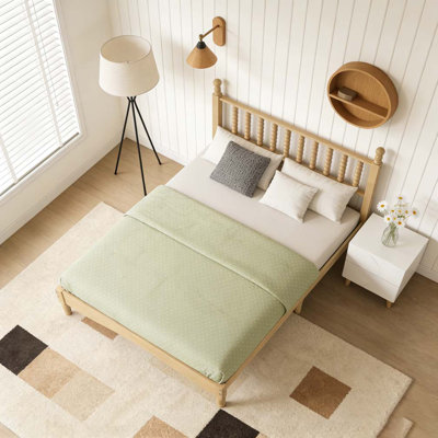 Lit plateforme en bois avec tête de lit en forme de gourde