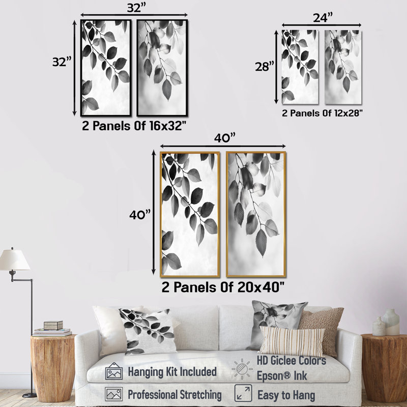 Feuilles noires et blanches, brise douce I - art mural floral 2 panneaux, H 28 po x l 25 po, Encadrement argenté