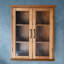 Over The Toilet Bathroom Wall Cabinet with Glass Paneled Doors, 2 Adjustable Shelves, Antique Brass Knobs, Oiled Oak Medicine Cabinet for Bathroom Storage