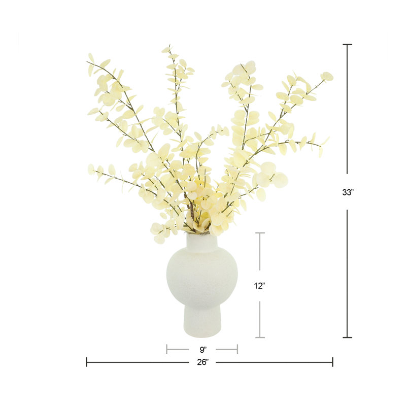 Arrangement moderne d'eucalyptus blanchi dans un vase décoratif en céramique