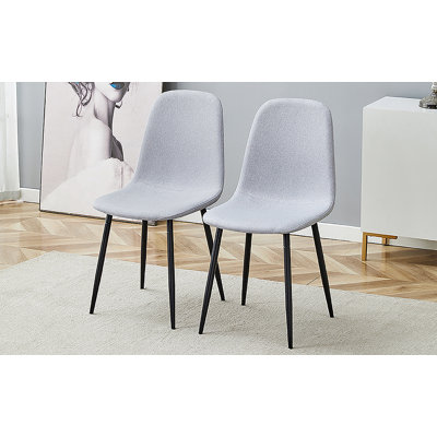 Confortable ensemble de chaises de salle à manger en lin et en coton - Six pièces en gris clair. Siège et dossier intégrés, matériau en lin et coton, assorti à la maison moderne.