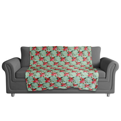 Jeté polaire rouge à motif floral