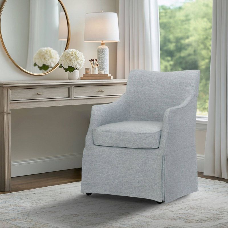 Chaise rembourrée avec accoudoirs et roulettes cachées, Bleu