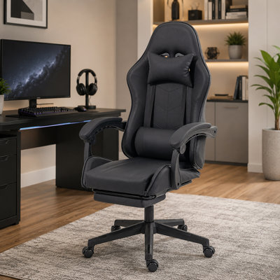 Ergonomic gaming chair with footrest and lumbar massage  High-back racing office chair  Computer chair with headrest