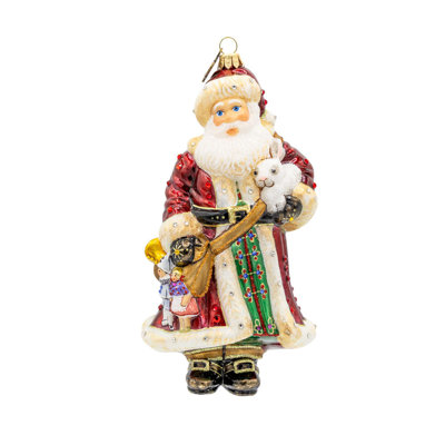 Ornement en forme de bras de père Noël plein de cadeaux