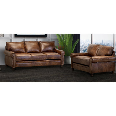 Eddahbi Brown Top Grain Leather Sofa And Loveseat