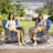 Fiorillo 4-Person Swivel Wicker Rattan Seating Group With Cushions And Square Fire Pit Table-1818847079