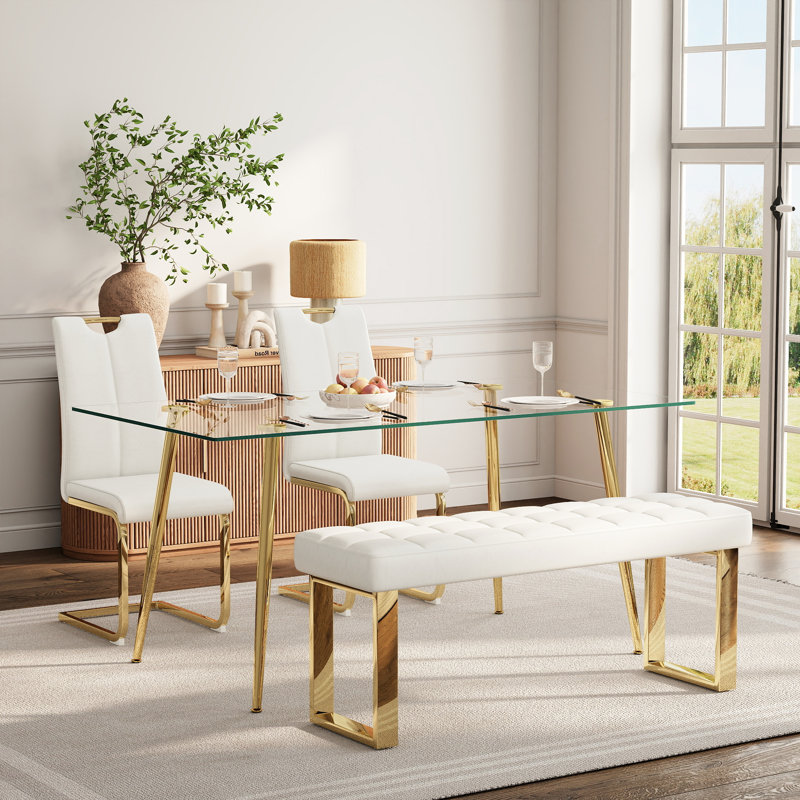 Ensemble de salle à manger en verre pour 4 à 6 personnes, de style moderne, comprenant une table de cuisine rectangulaire en verre, des chaises rembourrées en similicuir et un banc.