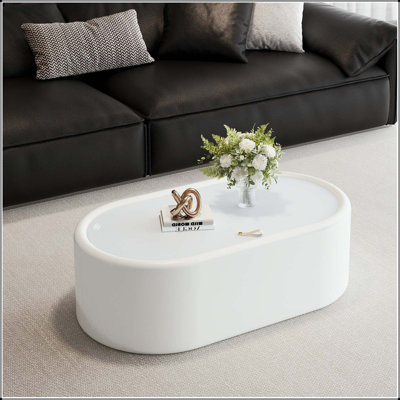 Table basse ovale cachée avec rangement en verre trempé et revêtement en cuir blanc