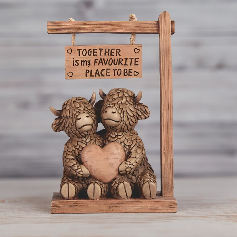 Figurine de couple de vache Highland