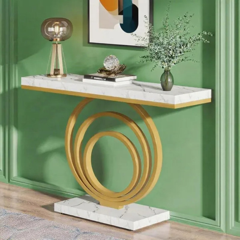 Console moderne à cadre doré, table d'entrée effet marbre avec piètement en anneau géométrique en métal