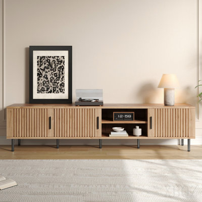 Meuble télé moderne de 78 po pour téléviseur de 85 po ou moins, centre de divertissement avec rangement fermé et gestion des câbles, charnières à fermeture en douceur, pieds robustes en fer pour le salon