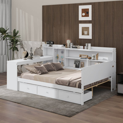 A Full-Sized Wooden Daybed With Three Built-In Drawers And Integrated USB Charging Ports