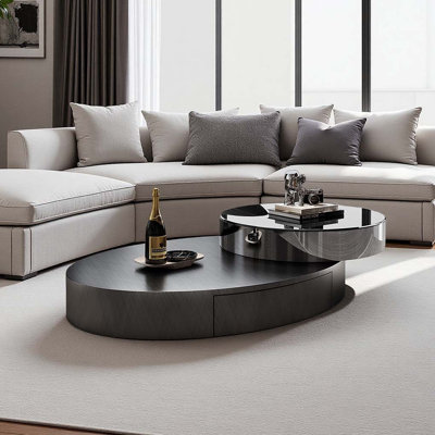 Modern Minimalist Rotating Coffee Table by Orren Ellis