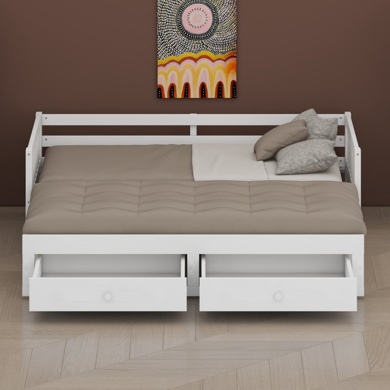 Le lit de jour avec lit gigogne et tiroirs intégrés se transforme en espace de couchage pour les invités., White