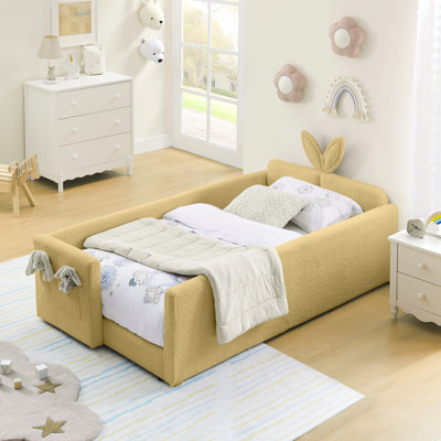 Lit plateforme tapissier simple avec tête de lit mignonne en forme d'oreille de lapin, avec barrière de sécurité et poche, tissu bouclé