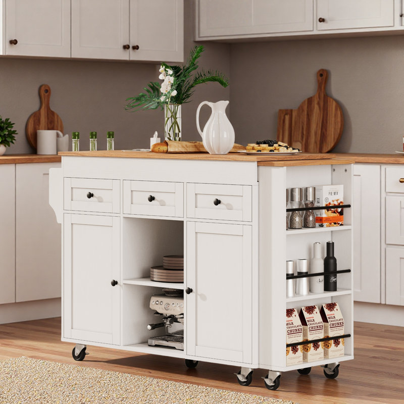 Îlot de cuisine roulant avec table de salle à manger extensible, station de charge, support de rangement ouvert à trois niveaux, 3 tiroirs et 2 armoires de rangement