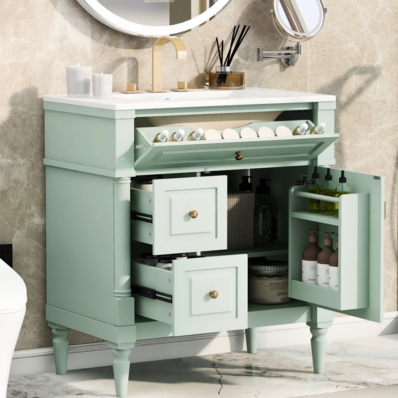 Meuble-lavabo autoportant de 76 cm (30 pouces) avec lavabo en céramique et rangements organisés. Meuble-lavabo de salle de bain de 76 cm (30 pouces) avec 3 tiroirs et portes coulissantes fonctionnelles.