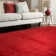 Natonia Shiny Shaggy Red Area Rug