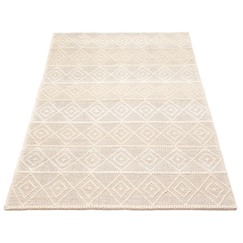 Tapis beige nouvel âge en laine 4 pi 11 po x 8 pi Delisma
