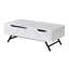 Table basse blanche avec plateau relevable
