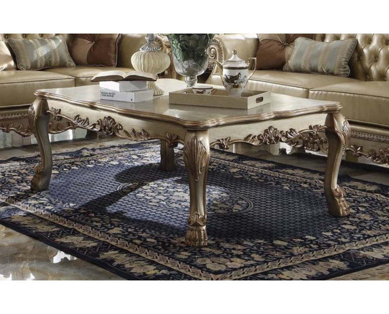 La table basse Dresde à finition dorée et patinée, une pièce maîtresse intemporelle et élégante pour votre espace de vie.