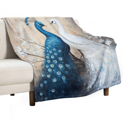 Jeté de paon faisant face à des branches fleuries, jeté en flanelle de luxe, couverture douce et chaude pour le canapé-lit du salon