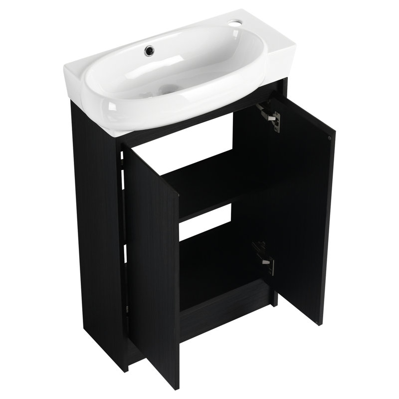 Meuble-lavabo autoportant de 23 po. Conception compacte moderne. Charnières de porte à fermeture en douceur. Espace de rangement suffisant. Couleur châtaignier noir. Armoire facile à rafraîchir, châtaignier, lavabo en céramique, portes, contemporain