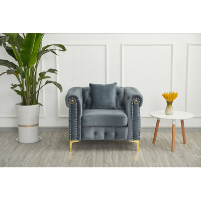 Fauteuil rembourré avec pieds en métal