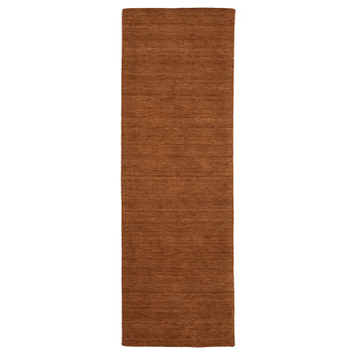 Tapis en laine rouille unie Makhari