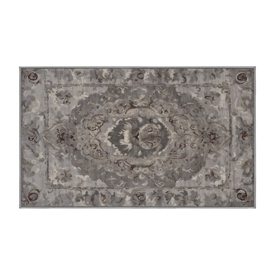 Tapis gris soyeux et moelleux