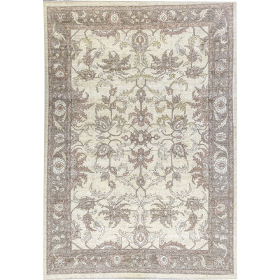 Tapis ivoire et doré de haute qualité noué à la main