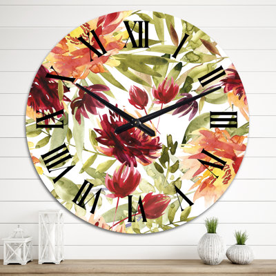 Horloge murale orange et rouge sur fond blanc