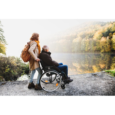 " Senior Couple With Wheelchair "