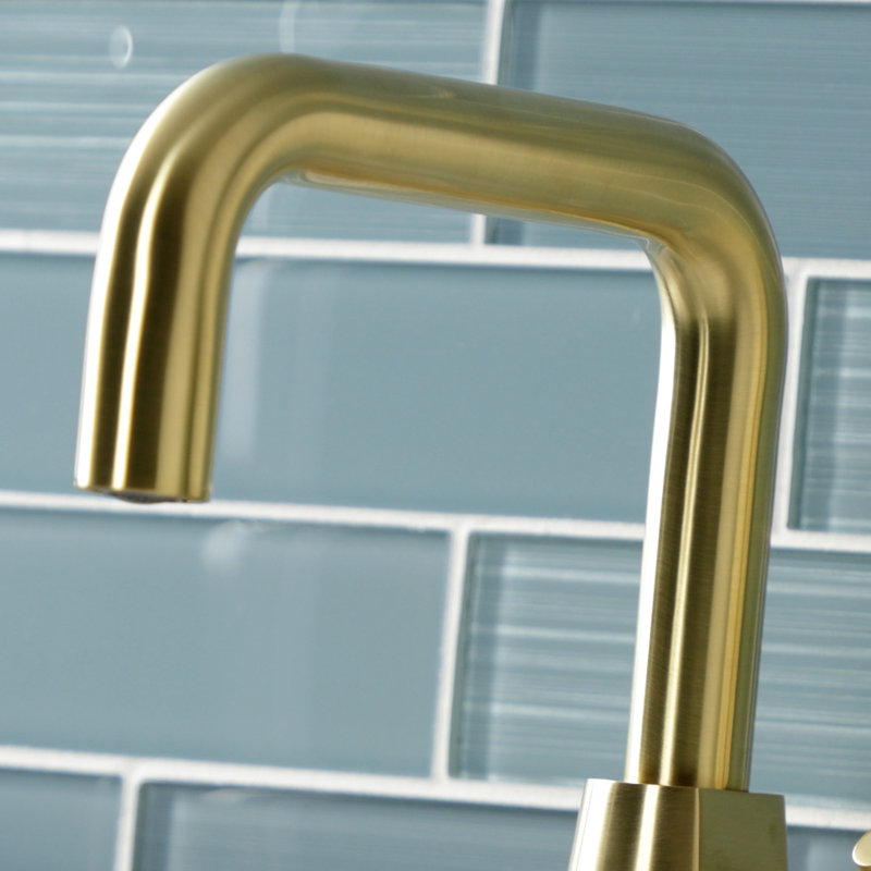 Kingston Brass Constantine Two-Handle 1-Hole Deck Mount Bathroom Faucet with Push Pop-Up, Brushed Brass