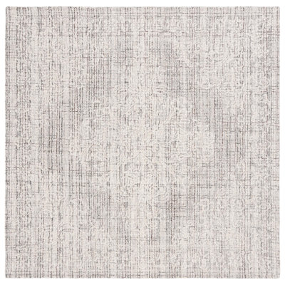 Ebony Hand Tufted Wool Cotton Pet Oriental Rug in Brown/Ivory