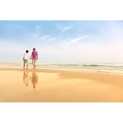 Couple de personnes âgées à la plage par Fredfroese