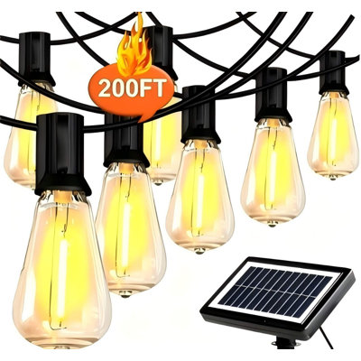 200Ft. Outdoor Solar Powered 24-Light Led St38 String Lights With E12 Base - Waterproof Retro Edison Bulbs For Patio, Garden & Cafe - Warm White (2700K) - Black Wire