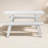 Jack 6-Person Outdoor Dining Set with Polyresin Teak Table and Two Benches, White Powder Coated Frame and White Polyresin Top